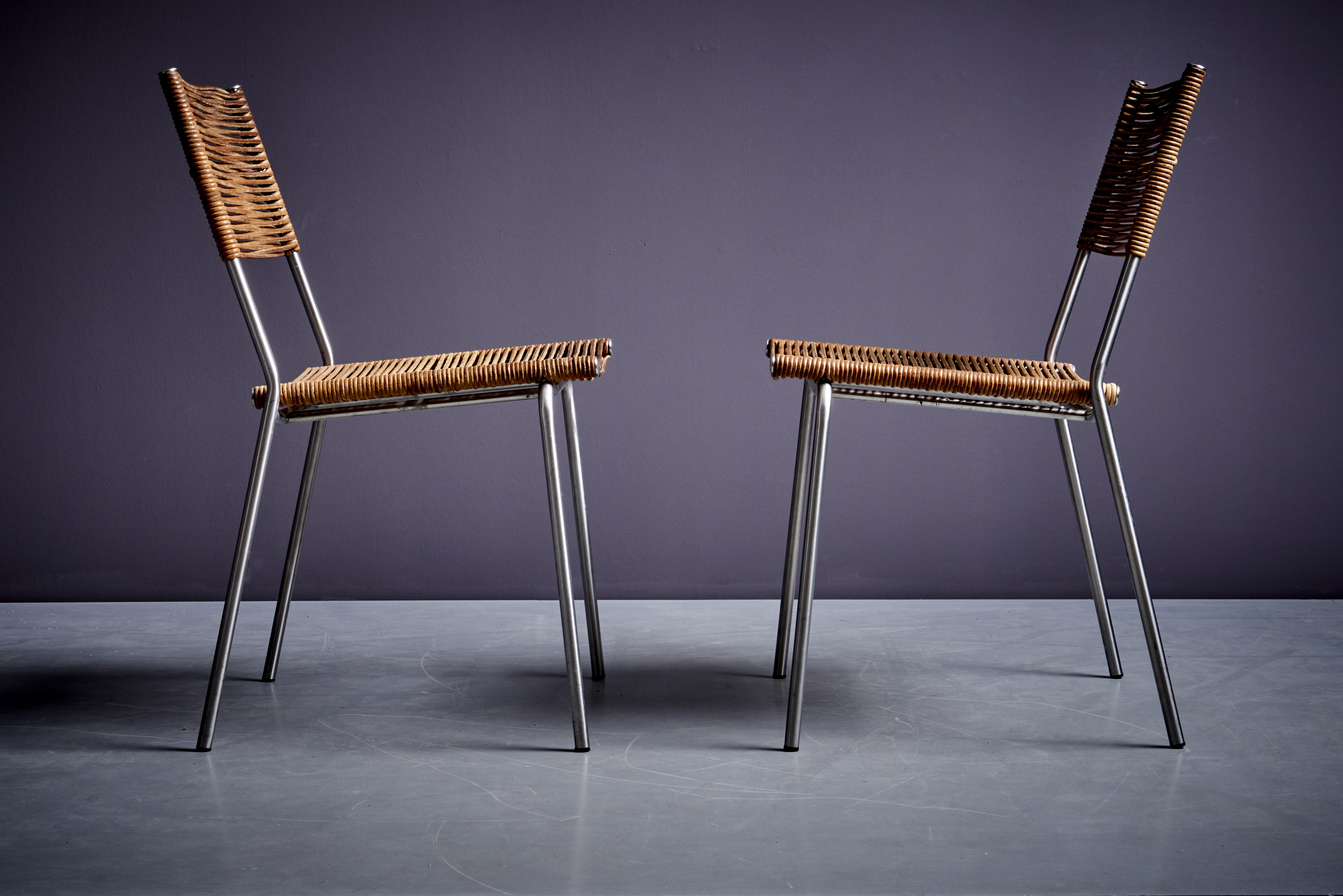Set of two leather Bonacina Miss B2 chairs by Tito Agnoli